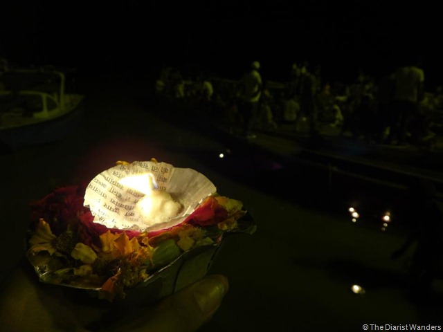 Varanasi Puja - Candle and Flowers